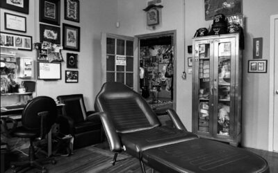 20240723-nc_southern_swank-8 During a 2006-2007 survey of businesses in and around the Depot District of Raleigh, North Carolina, I visited an eclectic boutique on West Hargett Street called Southern Swank and was welcomed by proprietor Luva Zacharyj. Part gift shop, part art project, Southern Swank emerged to operate in other Raleigh locations over the years, selling mostly vintage clothing. An apparently inoperative web store still exists in 2024, while Zacharyj — who also works as a model — is active in the Chapel Hill arts scene. Within Southern Swank, tattoo artist Marco Sullivan operated a tattoo studio. Sullivan appears to still be active in Raleigh today.